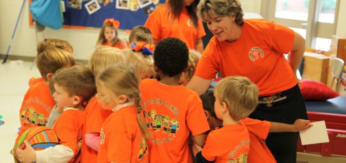 Preschool class with teacher.